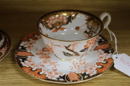 A Dresden floral encrusted cup and saucer, a quantity of Royal Crown Derby teaware and a Sitzendorf wall mirror